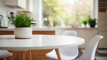 Vase with flowers on wooden table in modern kitchen.