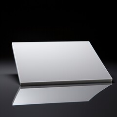 White square glossy plastic or glass plate on black reflective surface