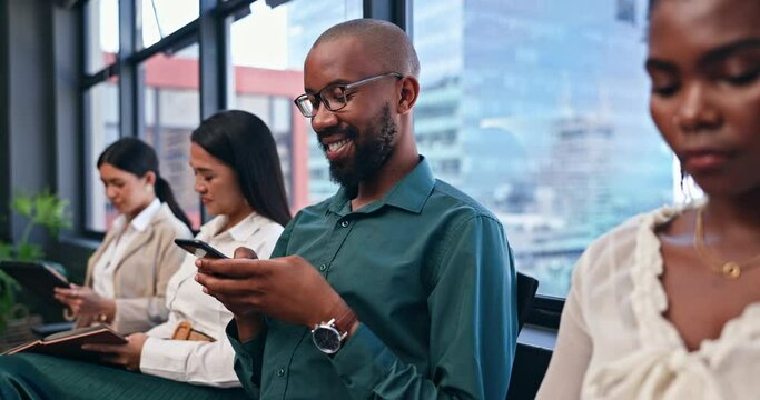 Happy man, phone and waiting at office for networking, social media or communication. Male person or intern typing on mobile smartphone for online search, chatting or texting while sitting in row