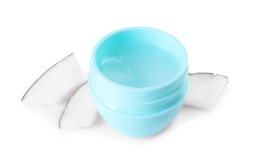 One lip balm and pieces of coconut isolated on white