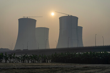 Cooling towers of a nuclear power plant at dawn. Ruppur, Bangladesh