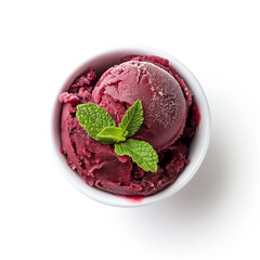 A cup of acai berry sorbet with a mint sprig top view isolated on a white background  - obrazy, fototapety, plakaty