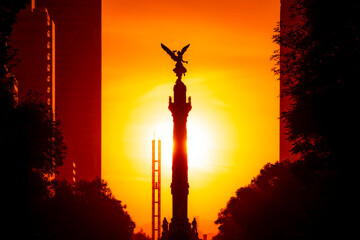 The Angel of Independence statue placed on Promenade of the Reform in Mexico city between tall...