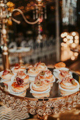 several snacks on a table, at a luxurious party
