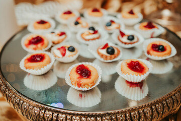 several snacks on a table, at a luxurious party