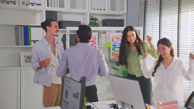 Group of multi-Ethnic businessman and businesswoman dancing in office. 