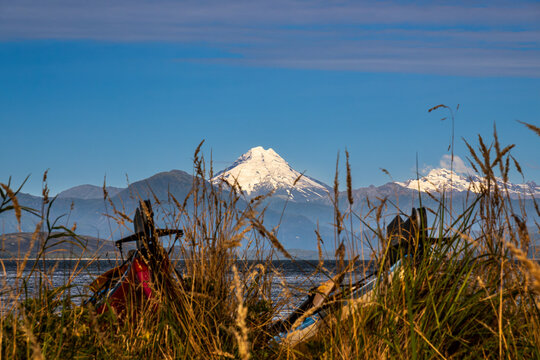 sea kayaks on a beach in the chonos archipelago patagonia chile room for text