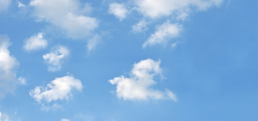 Light blue sky and white clouds. With copy space.	