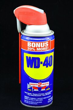 WD 40 penetrating oil in a spray can with a smart straw nozzle
