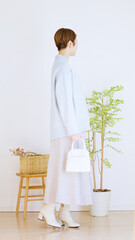 女性冬服のファッションコーディネート全身（縦向き）