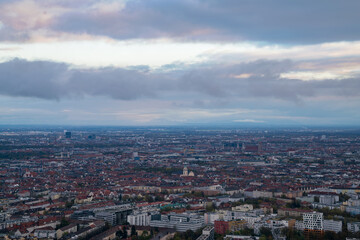 Fototapeta na wymiar Autumn Sunset to Nightfall Over Munich Skyline Aerial View