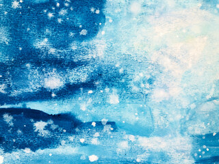 Abstract watercolour snowflakes water blue background 