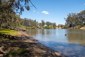 Murray River at Cobram, bordered by an Australian native natural bush. The inland regional town is...