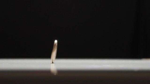 American Penny Spinning on Table