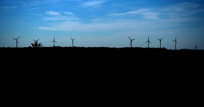 Windmill turbine silhouette / Matane