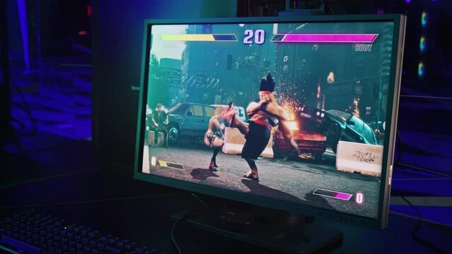 Player suffering defeat in the match of the pc fighting game. Gamer defeated by the online opponent in the pc game. Hero defeated by the challenger in the combat action melee battle pc game level.