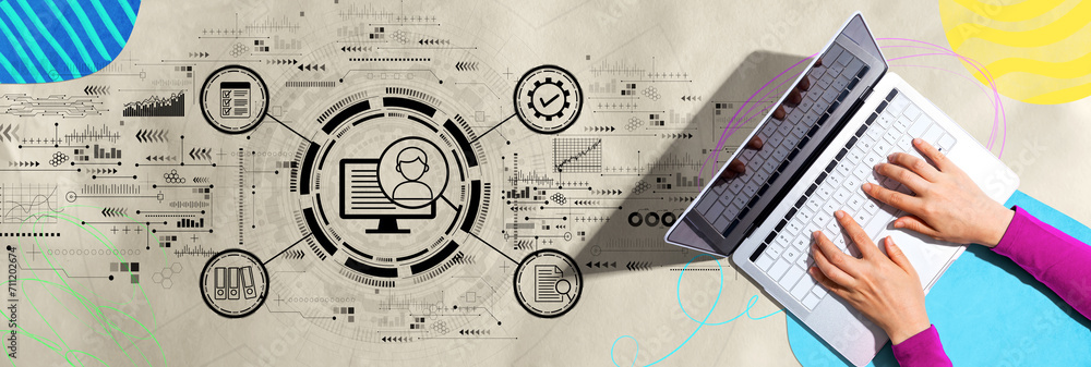 Poster document management system concept with person using a laptop computer