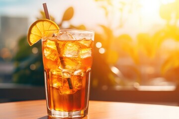 With its striking amber hue, this soda radiates a warm and inviting glow, promising a burst of refreshment and a taste that is reminiscent of sunny summer days. - obrazy, fototapety, plakaty