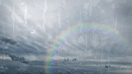 cute rainbow after the heavy rain on clouds in the sky - photo of nature