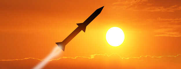 Fired missiles fly to the target. Missiles at the sky at sunset. Missile defense. Rockets attack concept. - obrazy, fototapety, plakaty