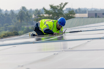 Inspector examination of photovoltaic modules using a thermal imaging camera. Engineer Checking...