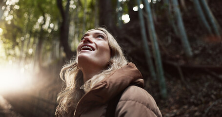 Nature, hiking and happy woman travel in forest on vacation, holiday or tourism in Japan. Smile,...