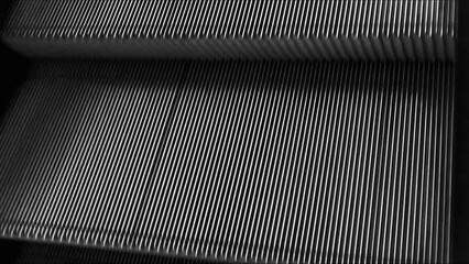 Escalator moving upward in low light, urban transport background with optical illusion effect, cinematic and futuristic abstract motion scene.