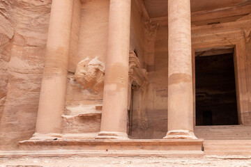The part of main fasade of the Al Khazneh - the Nabatean temple in the Nabatean Kingdom of Petra in...
