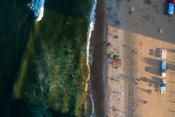 Aerial View Top Down of People on the Beach at Sunset with Shadows in Virginia Beach