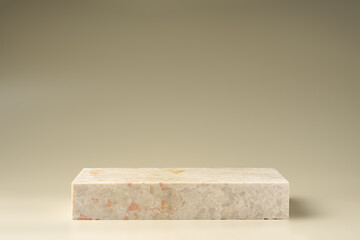 Pieces of granite stone on beige background for display