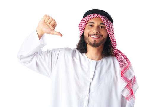Young Arab man in traditional clothing pointing on himself on white background