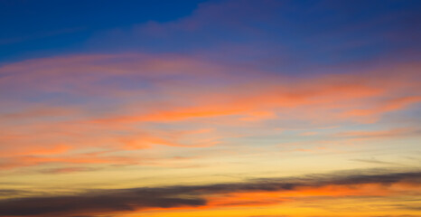 Sunset Sky with Twilight in the Evening as the colors of Sunset Cloud Nature as Sky Backgrounds,...