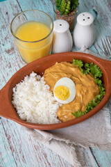Aji de gallina chicken spicy cream served with rice traditional peruvian food