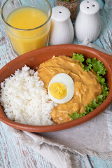 Aji de gallina chicken spicy cream served with rice traditional peruvian food