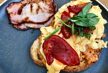 Breakfast eggs and tomato