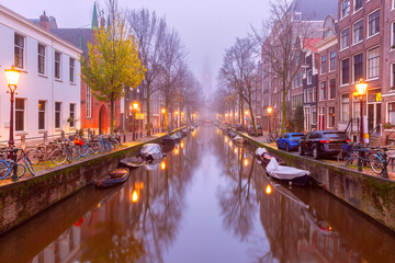 Amsterdam canal Groenburgwal with Zuiderkerk, southern church, Holland, Netherlands.