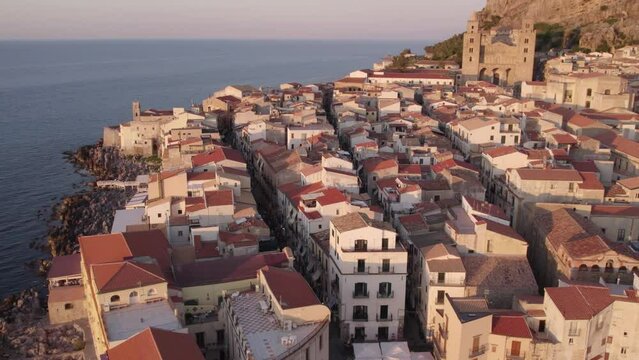 Aerial drone view of the famous Celafu medieval old town in Sicily, Italy.