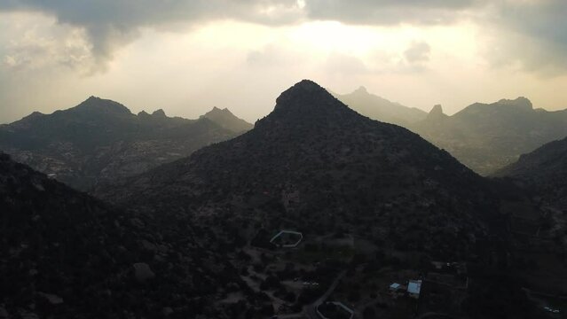 Drone footage of a sunset over the mountains in Taif, Saudi Arabia