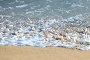 splashing water on the beach