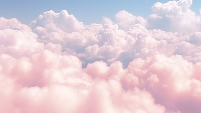 Soft, dreamy pink clouds resembling cotton candy in a clear sky, evoking a feeling of whimsy and fantasy.