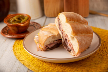 Mexican ham sandwich, in Mexico it is called Torta de Jamon, it is the most popular of the Mexican Tortas and the recipe varies depending on who prepares it, made with bolillo o telera bread.