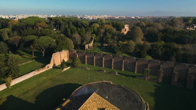 Mausoleum of Maxentius. Via Appia, Ancient Roman Road, Rome, Italy. Aerial Pullback Reveal
