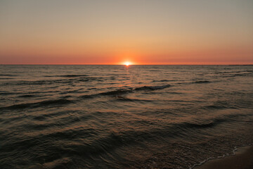 Fototapeta na wymiar Sunset on the sea as a background
