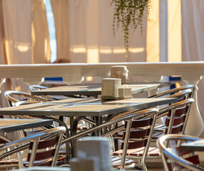 Metal tables with chairs in a cafe