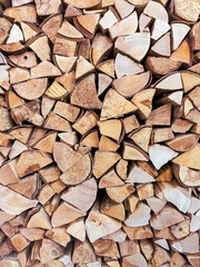 Chopped firewood as an abstract background. Texture