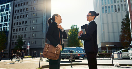 Asian, business people in city and bow for greeting, conversation with travel and commute to work. Professional man, woman and hello in Tokyo, journey and urban street, communication and respect