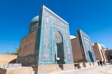 Fototapeta na wymiar Symmetrical decorative ornament of entrance to the tomb in Shah-I-Zinda