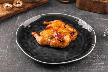 Roast tobacco gherkin chicken on a plate