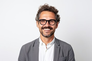 Portrait of a handsome man in eyeglasses smiling at camera