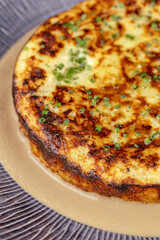 baked omelet with vegetables on a plate